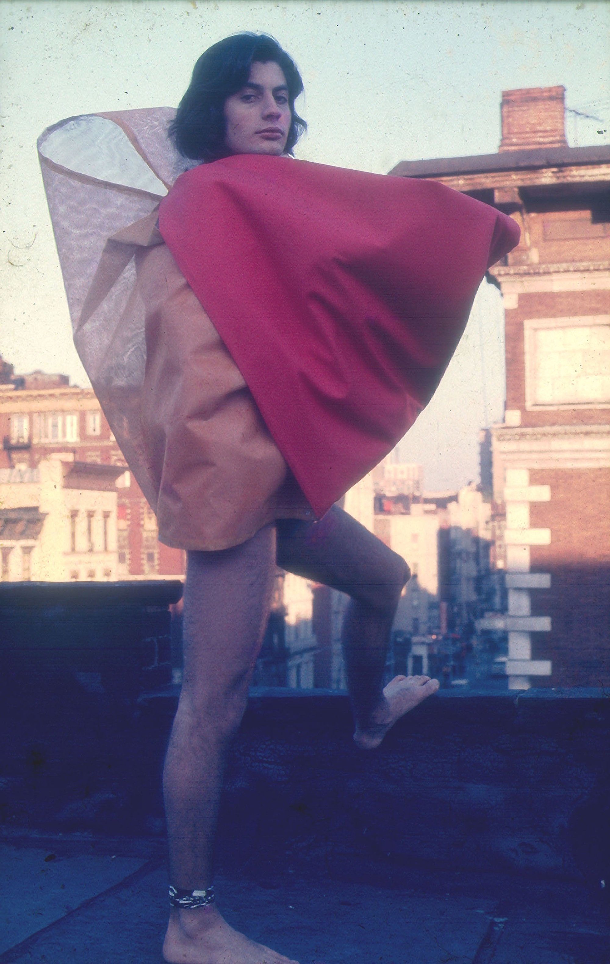 Hélio Oiticica, <i>Romero Cavalcanti Wearing Parangolé P32</i>, 1972. Cesar and Claudio Oiticia.
