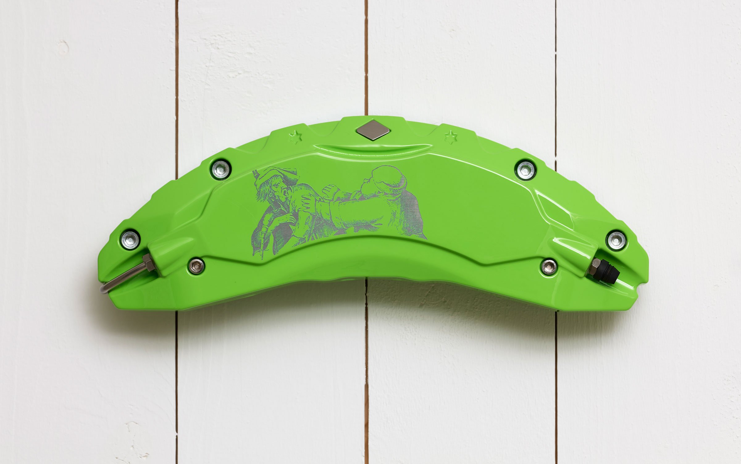 Kaare Golles: <i>STEROID (The Fat Kitchen)</i>, 2026. Tesla brake caliper cover with engraving. Foto: Anders Sune Berg
